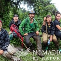 The Summit Team Thoroughly Covered in Mud, Bisoke Volcano, Rwanda