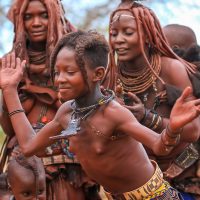 A Young Himba Girl Dancing Ondjongo, Namibia