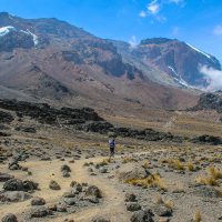 A Porter on the Lonely Trail to Barafu Camp, Mount Kilimanjaro, Tanzania