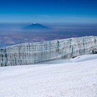 A Massive African Glacier with Mount Meru in the Background, Mount Kilimanjaro, Tanzania