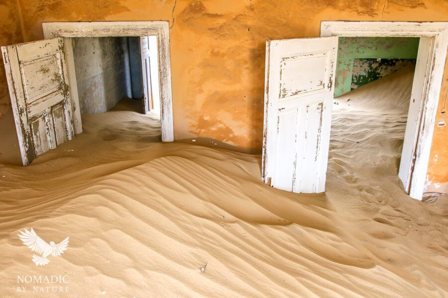 Sand Dunes Flowing through a House, Komanskop Ghost Town, Namibia