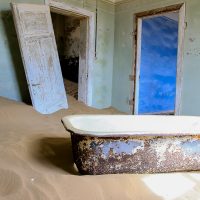 An Enamel Bathtub in the Ruins, Kolmanskop Ghost Town, Namibia